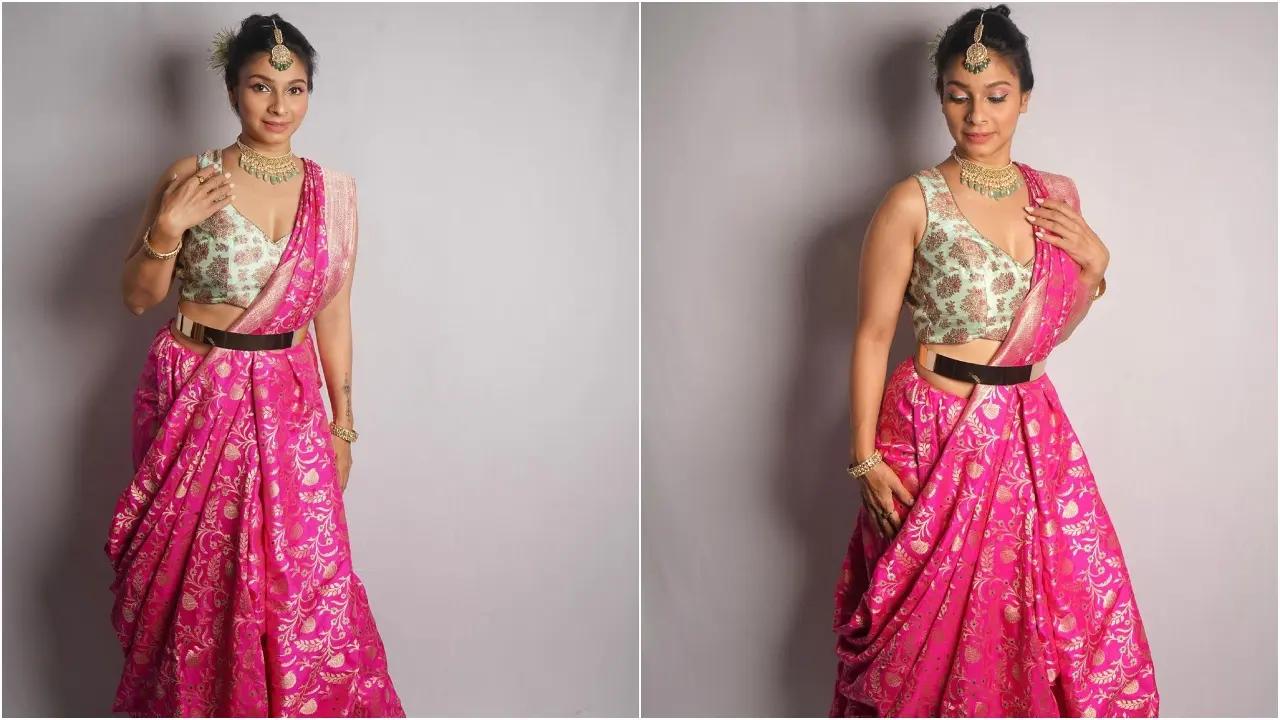 In this look, Tanishaa draped another saree in an indo-western style. This actress looked gorgeous