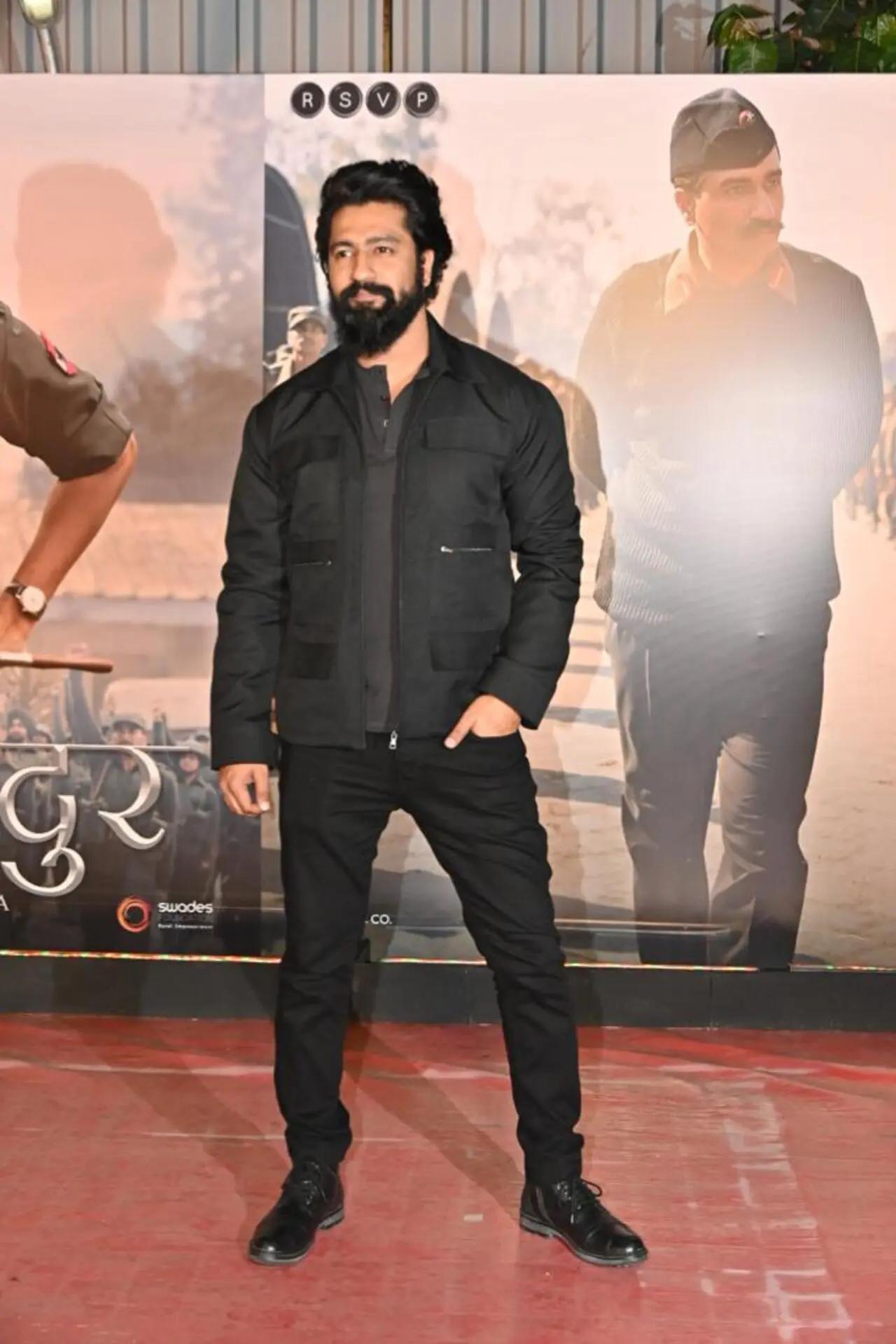 He wore black pants, a T-shirt and a black jacket