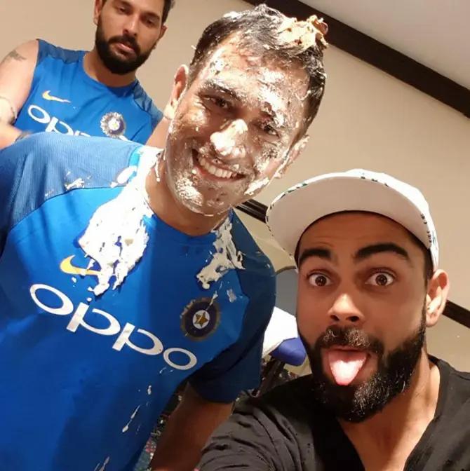 In picture: Virat Kohli shared a candid moment with former cricketer and skipper Mahendra Singh Dhoni on one of the latter`s birthdays