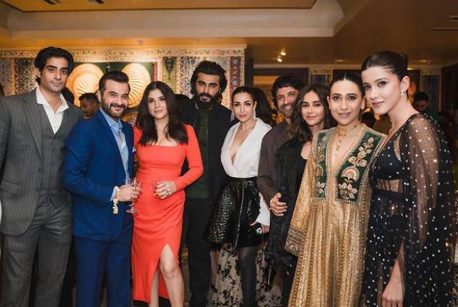 The Kapoors with Farhan Akhtar in the party