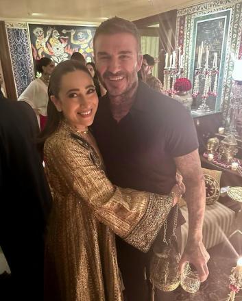 Karishma Kapoor embraces David Beckham with such joy.