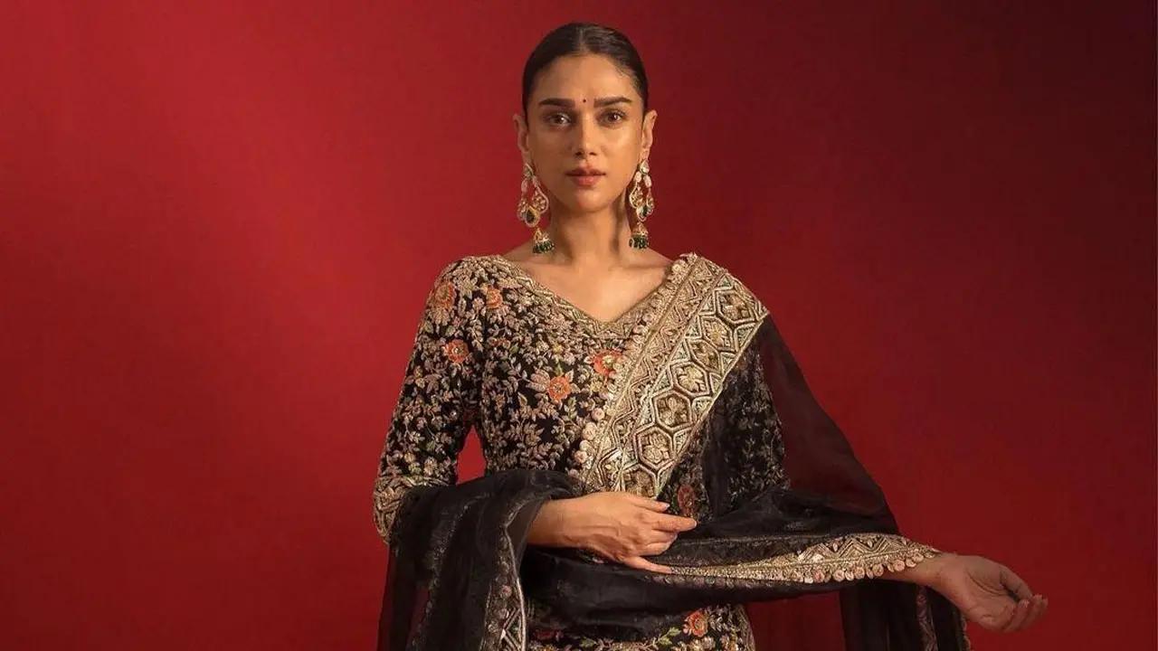 On the eve of Diwali, she wowed in a Manish Malhotra ebony silk sharara set with hand embroidered with vintage zari and flower scenic motifs.