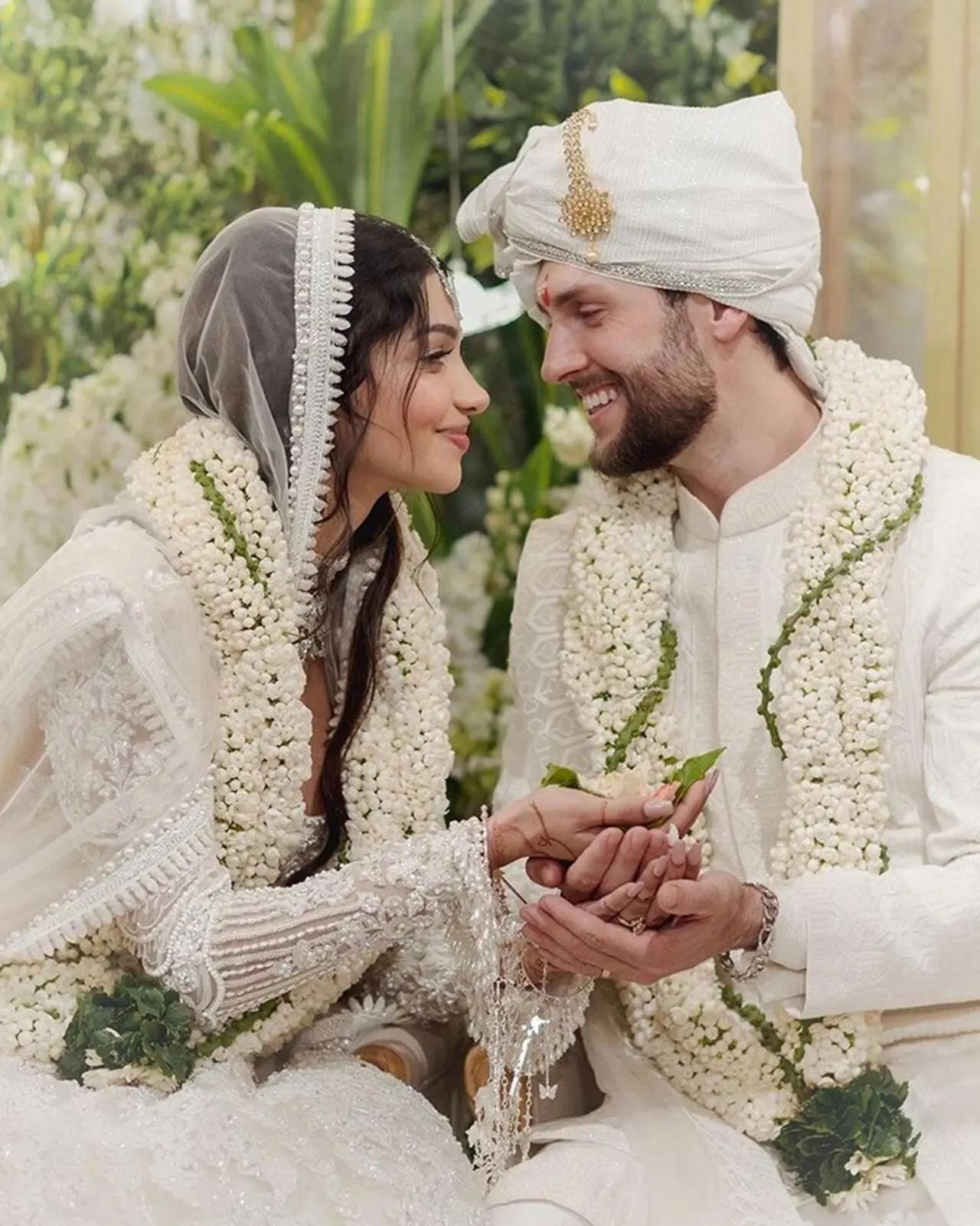 Ananya Panday`s cousin, influencer Alanna Panday, wore a Manish Malhotra lehenga. It was a white handcrafted threadwork lehenga