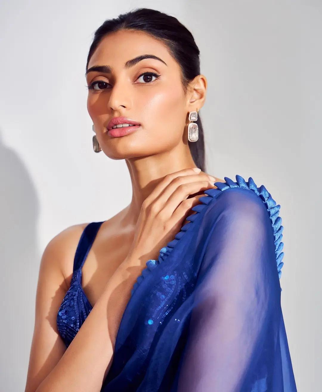 Athiya Shetty rocked a beautiful electric blue drape by Manish Malhotra, and everyone couldn`t stop talking about it for all the right reasons.