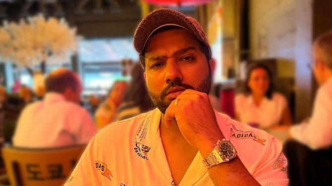 Posing from a local cafe somewhere, Rohit Sharma is the swag king!