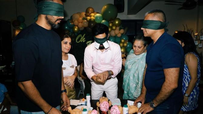 Here he is indulged in playing a fun game