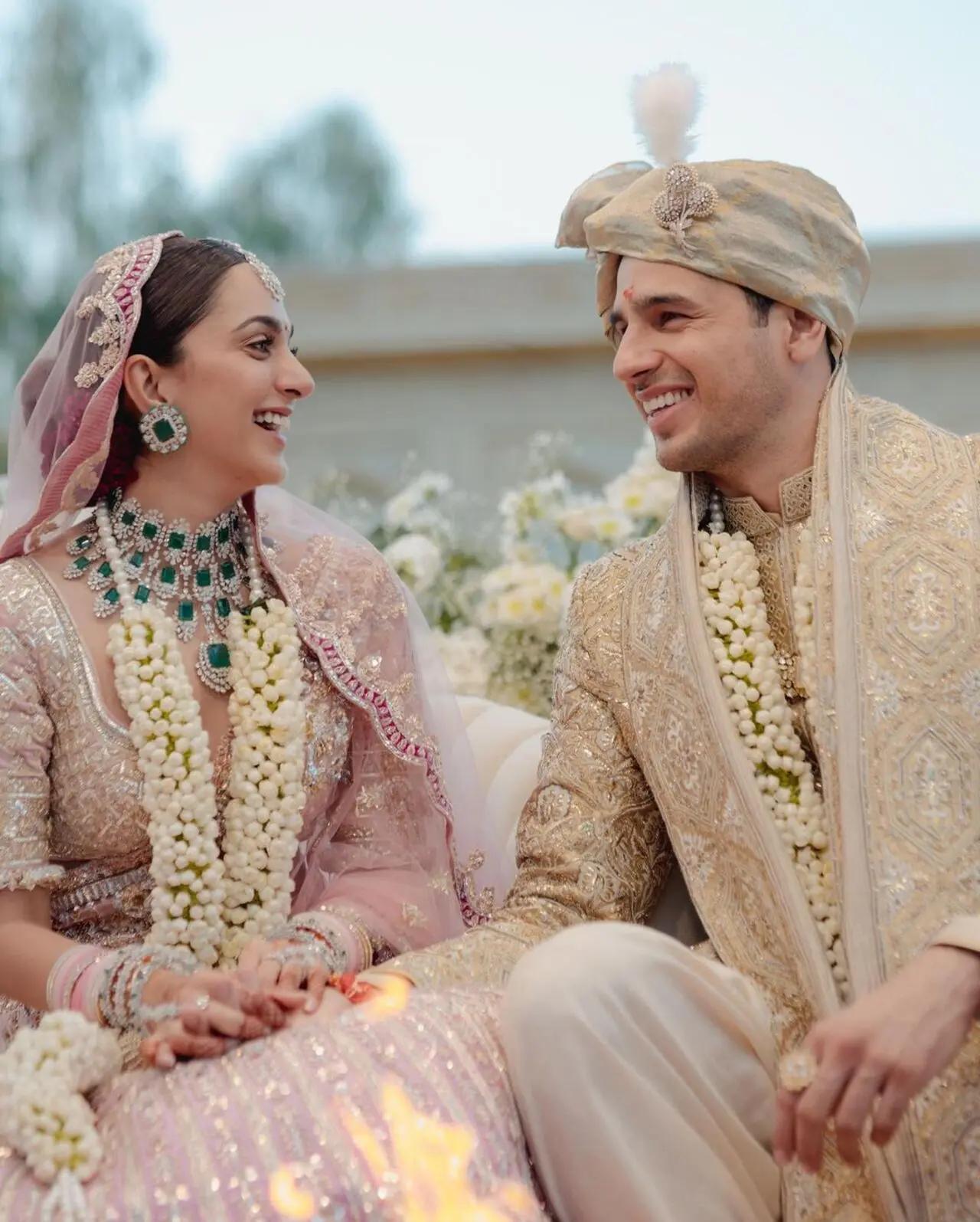 Kiara Advani was a Manish Malhotra bride. She wore an empress rose ombre lehenga with emerald jewellery from the designer`s collection. Her outfit had details of Roman architecture
