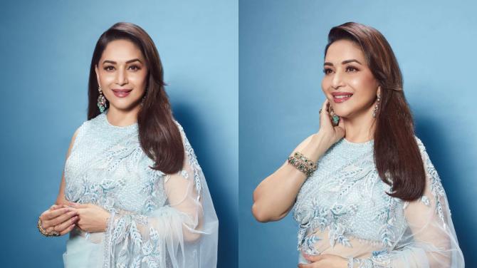 Nisha aka Madhuri Dixit in light Blue Saree