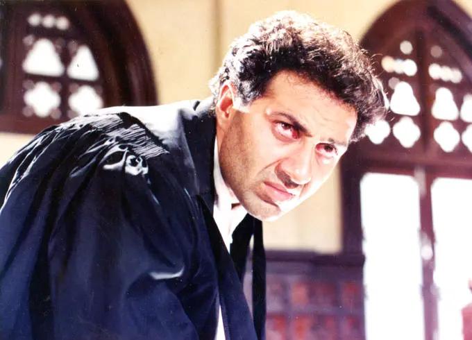 If you are a true-blue Sunny Deol fan, you must have not missed Sunny Deol`s best performance as a lawyer in Damini (1993). Did you? This film, which also starred biggies like Rishi Kapoor and Meenakshi Sheshadri, allowed Sunny to not only rule hearts but also awards nominations. He won several accolades including the National Film Award for Best Supporting Actor and the Filmfare Award for Best Supporting Actor.
In picture: Sunny Deol in a still from Damini, which is considered among his best performances.