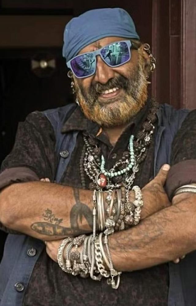 His attire is eye catching, and he strongly believes that is what attracts people around