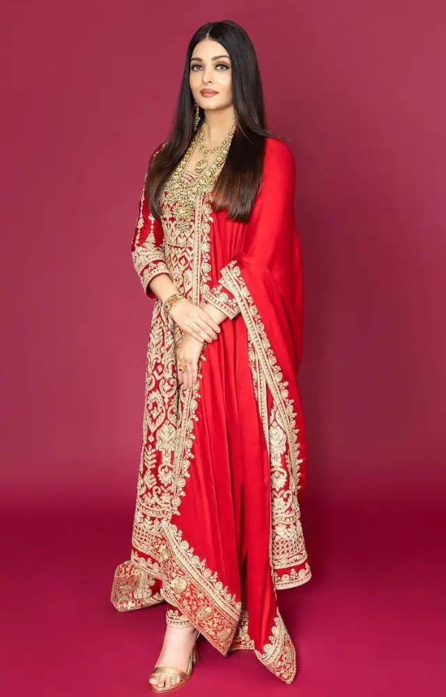 Aishwarya Rai`s outfit was a striking red anarkali suit with intricate golden thread work all over, including the pants and the dupatta`s border.