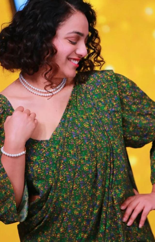 Nithya Menon is known for her simple yet elegant saree choices. She often opts for vibrant colors and traditional weaves.