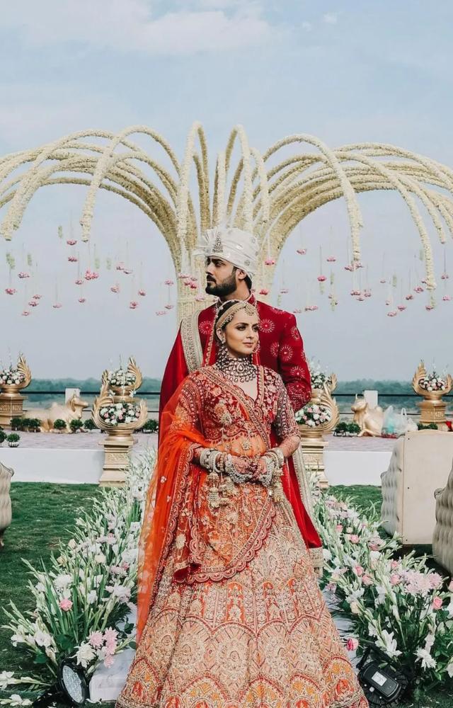 Akshay Mhatre was dressed in a red sherwani to complement his beautiful wife. The couple looked all shades of happy in the pictures from their grand wedding.