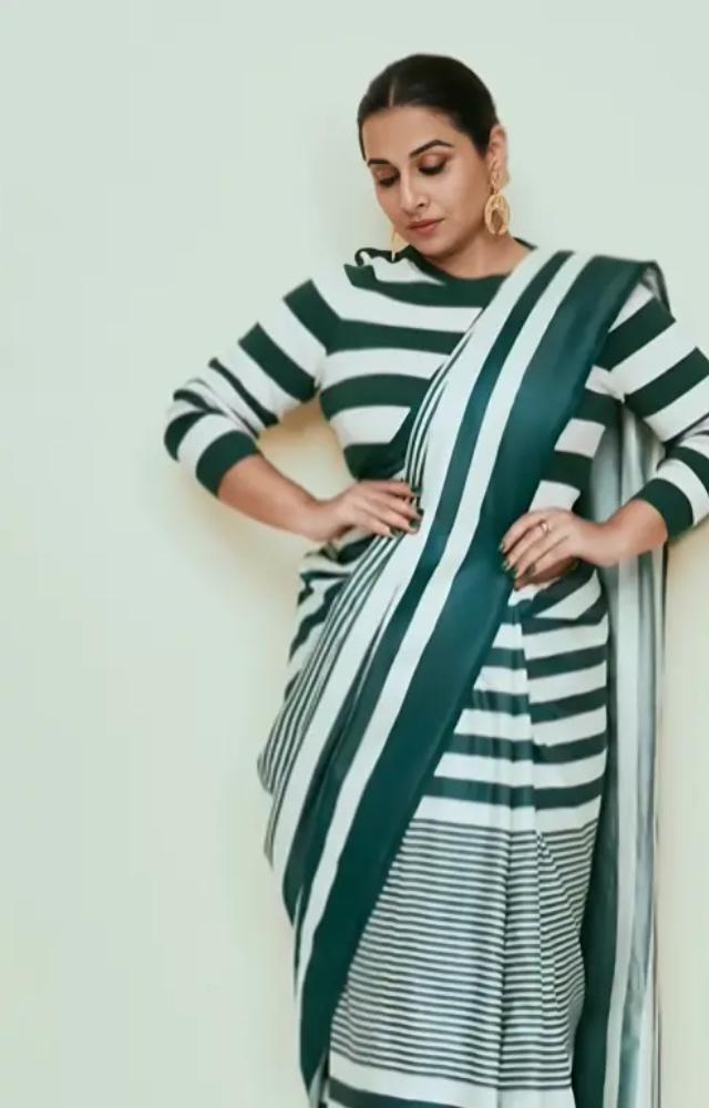 This wedding season, we`ve got you covered with Vidya Balan`s unmatched saree fashion. In this look, the actress wore a green and white striped saree
