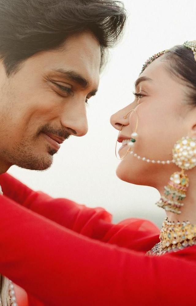 Aditi Rao Hydari`s statement jewelry complemented her bright red ensemble. Her golden jhumka accentuated her look.