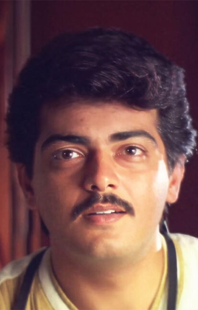 As Shiva, Ajith embodies a charming and persistent lover who wins over his initially reluctant love interest