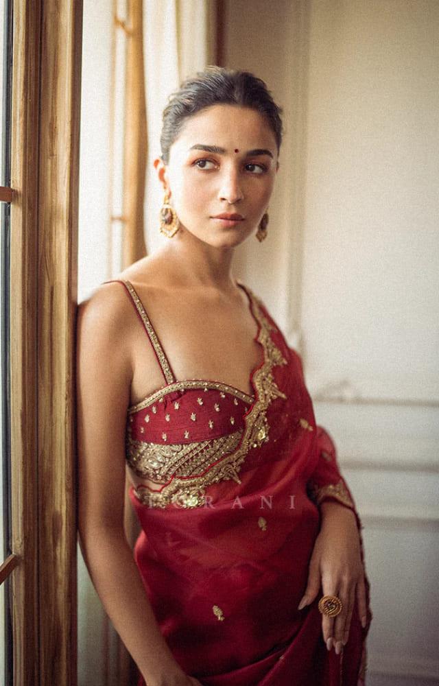 The Rocky Aur Rani Kii Prem Kahaani`s red saree should be your go-to choice if you`re looking for chic and royal vibes.