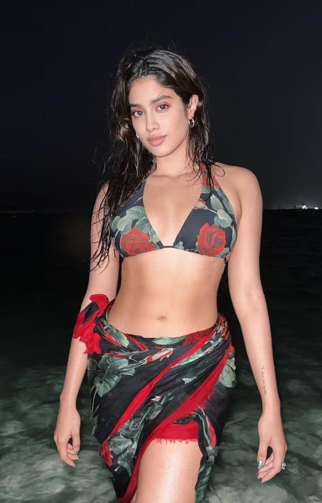 Janhvi effortlessly rocks vibrant bikinis and chic cover-ups, showcasing her youthful and trendy beach style.