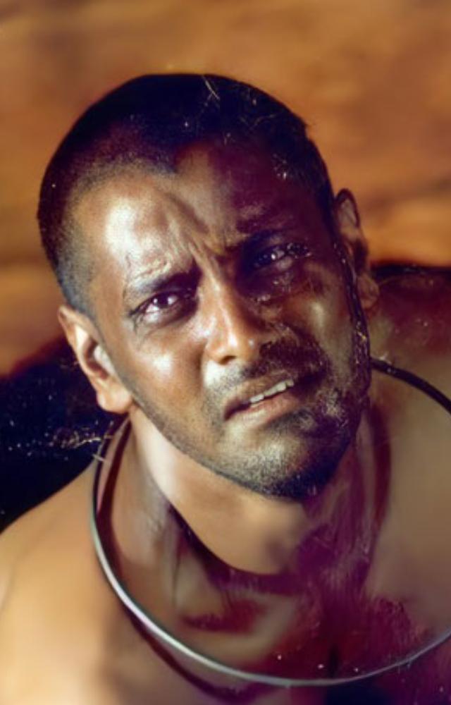 A mentally disturbed lover, showcasing Vikram`s raw vulnerability.
