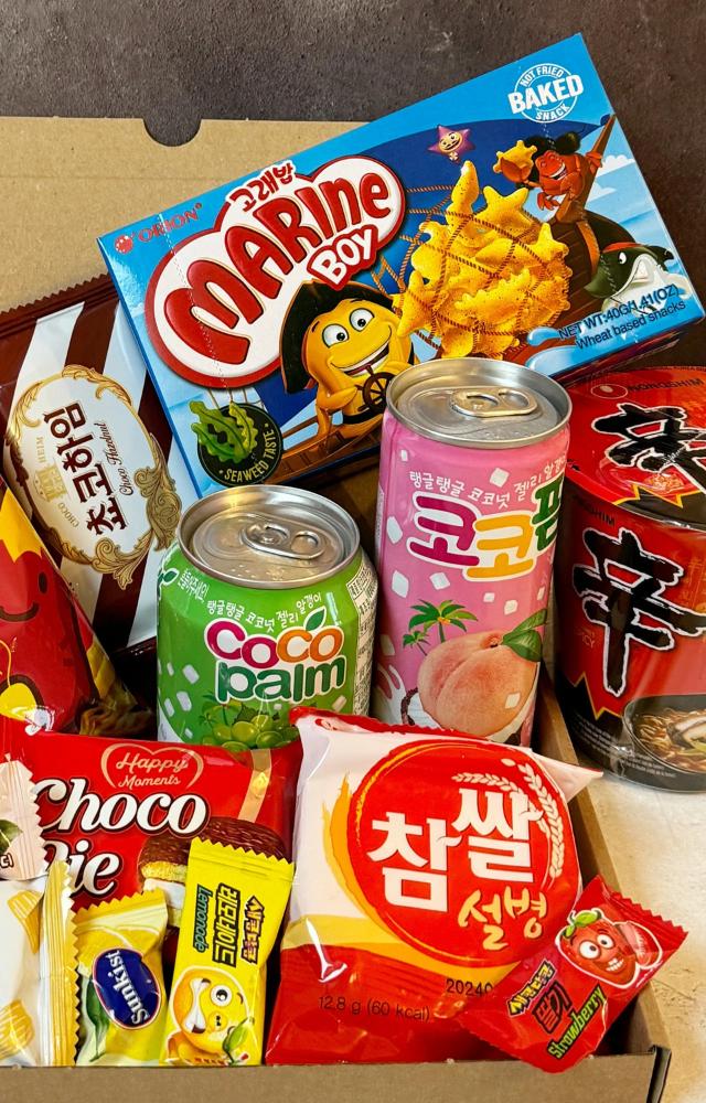 These are delicious and unique, and they make a great gift for anyone who loves Korean culture. Some popular options include Pocky, Choco Pie, Ramyeon, etc.