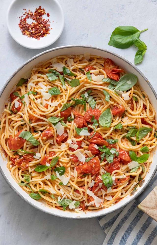 Saute garlic in olive oil; add chopped tomatoes and fresh basil. Mix with pasta, salt, pepper, and a dash of Parmesan for a refreshing bite.