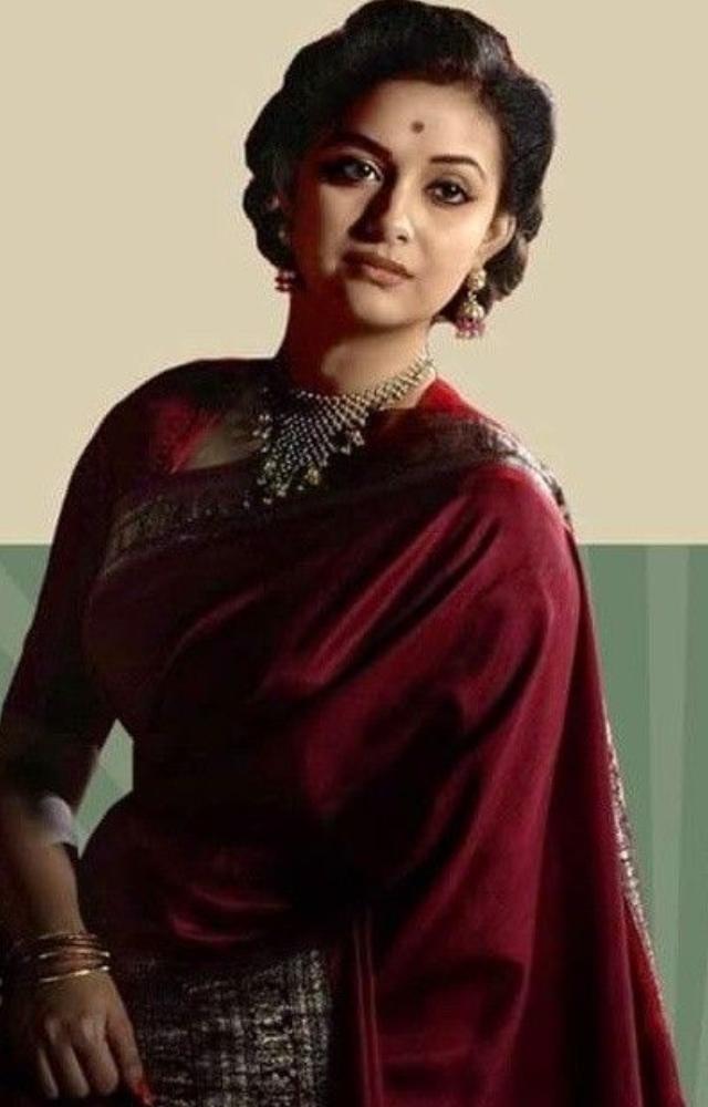 Keerthy Suresh portrays legendary actress Savitri, showcasing her struggles and triumphs in this acclaimed biopic.