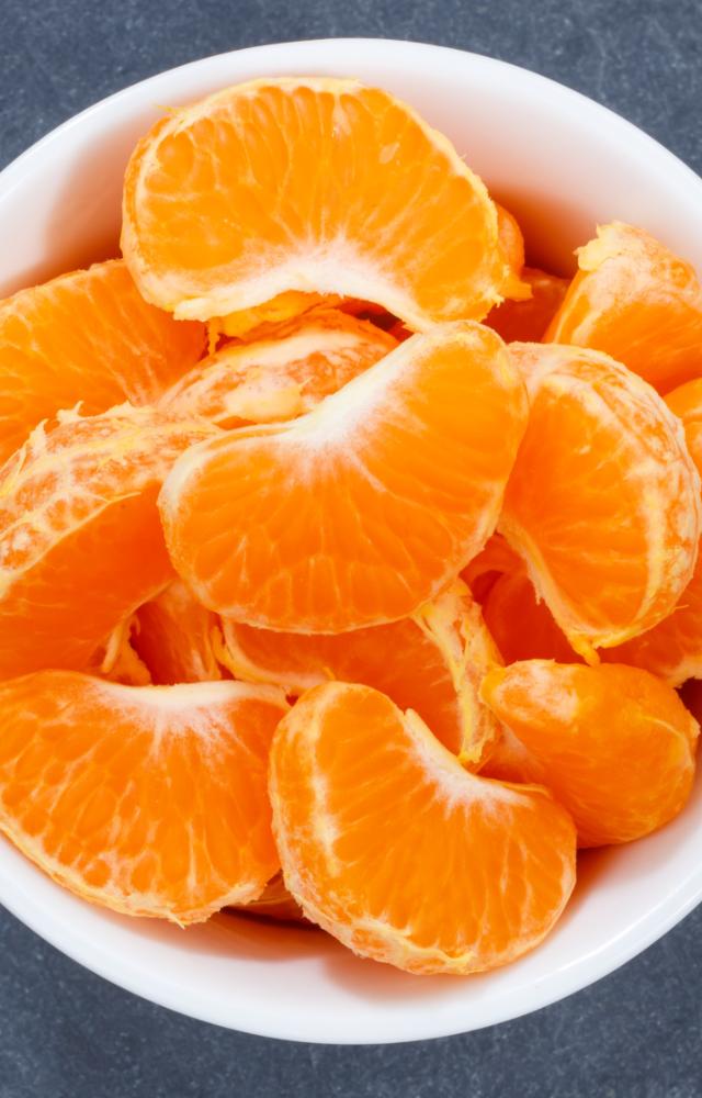 Vitamin C helps combat dark spots on the skin. Which is why, eating fruits rich in vitamin C like oranges or sweet limes, helps fight dark spots.