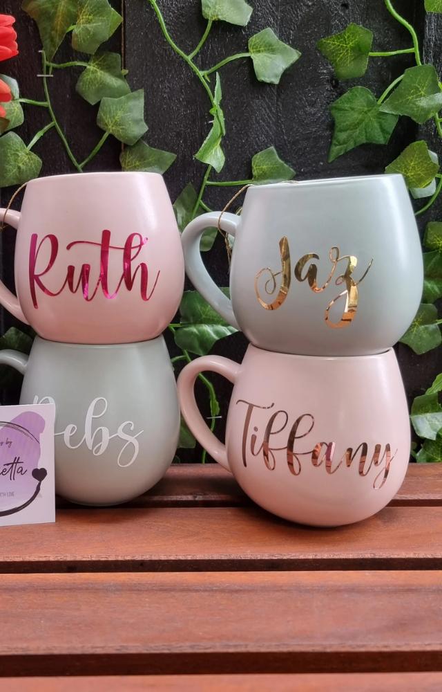 Buy plain mugs and write each friend`s name, a fun quote, or a cute design. This gives the gift a personal touch along with heartfelt messages.