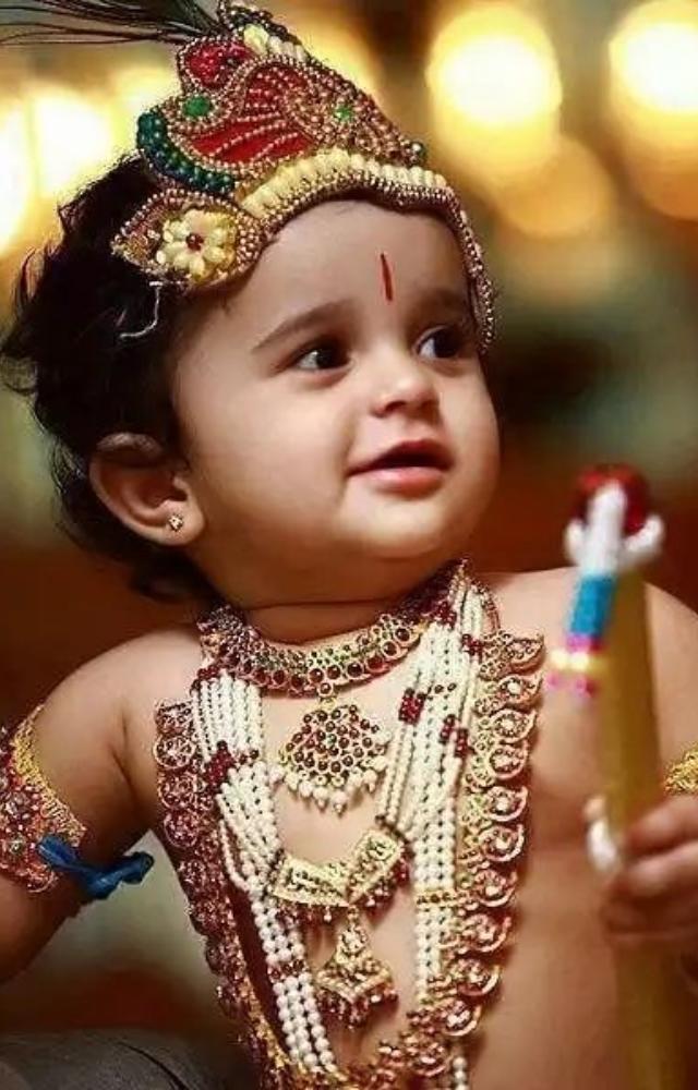 Adorn Krishna with traditional jewelry, including necklaces, bracelets, anklets, and rings, to enhance his divine appearance.