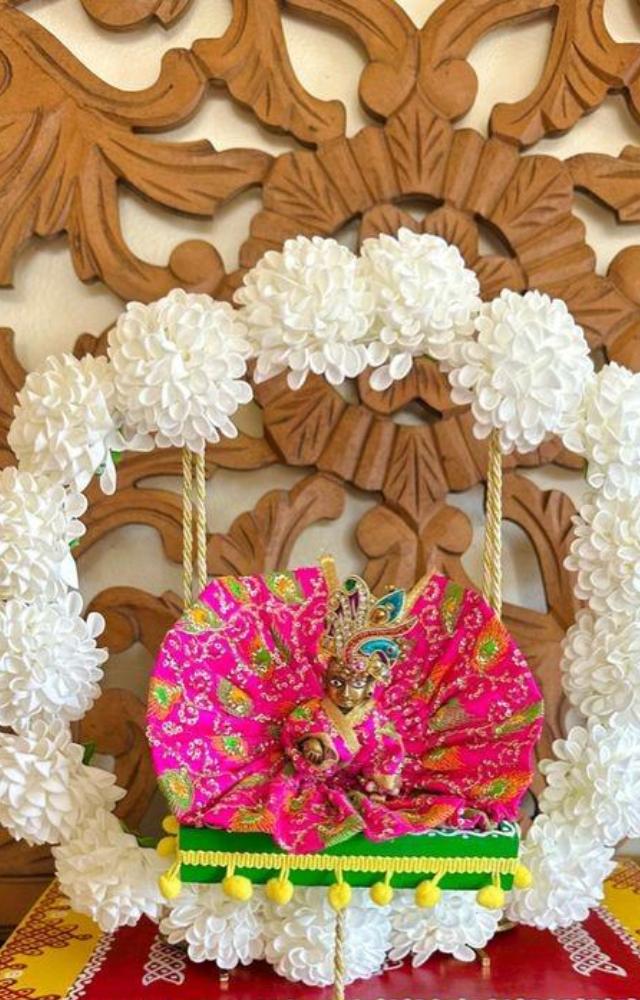 Use fresh, vibrant flower garlands, such as roses, marigolds, and jasmine, to create beautiful adornments around Krishna’s idol or image.