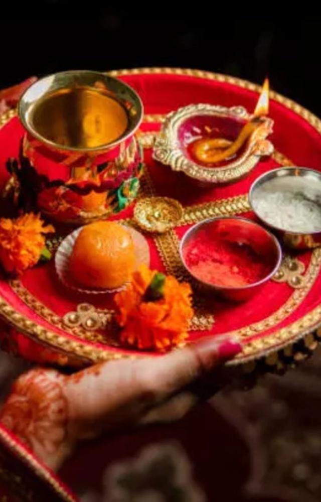 Women observe a strict fast on Karwa Chauth for their husbands` longevity, well-being, and health, praying to Lord Shiva and Goddess Parvati.