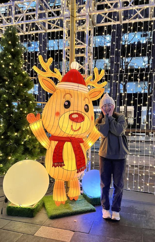 Christmas decorations often feature bright lights and colorful displays rather than traditional Western symbols like wreaths and stockings.