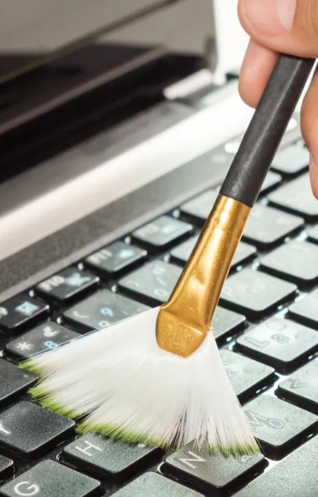 Compressed Air: Blow out dust and crumbs between keys using a can of compressed air.