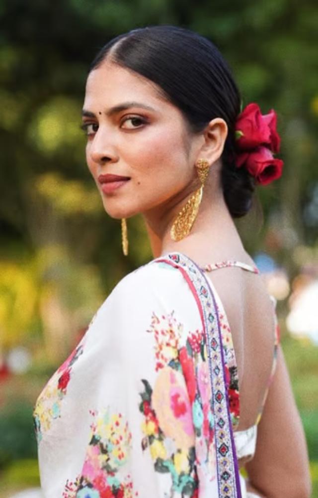Malavika has dazzled in traditional sarees, often choosing intricate designs and rich fabrics that enhance her grace and poise, such as her stunning saree