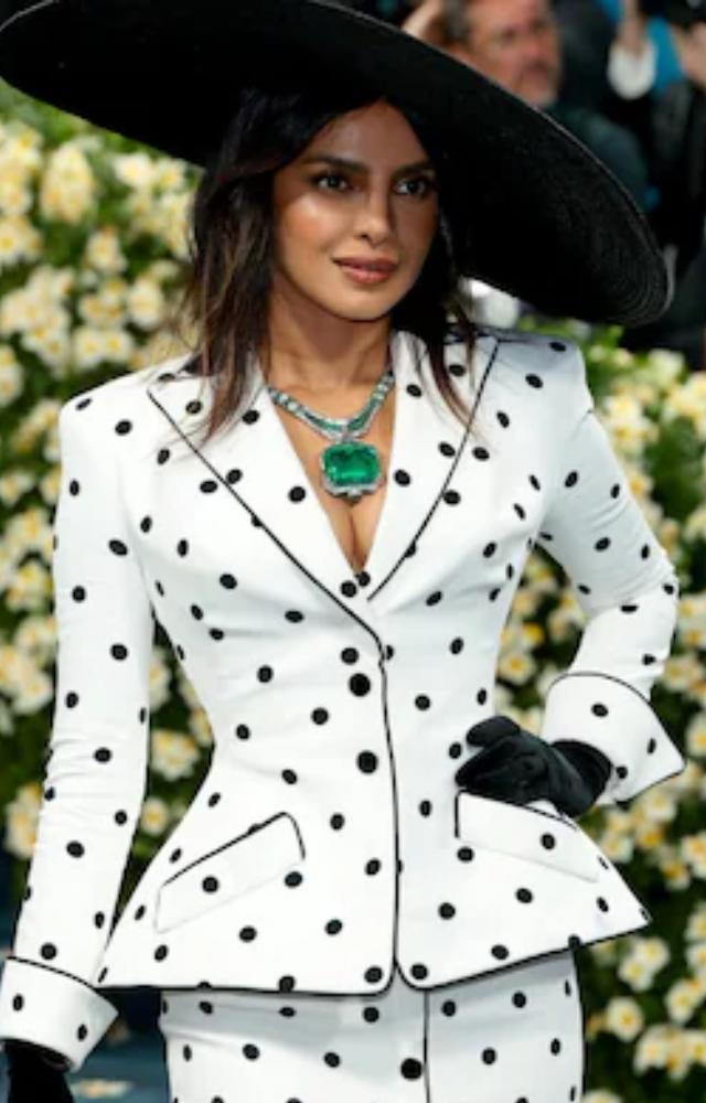 Returning for her fifth Met Gala appearance, Priyanka brought old Hollywood glamour with a retro twist in a polka dot suit dress by Olivier Rousteing at Balmain