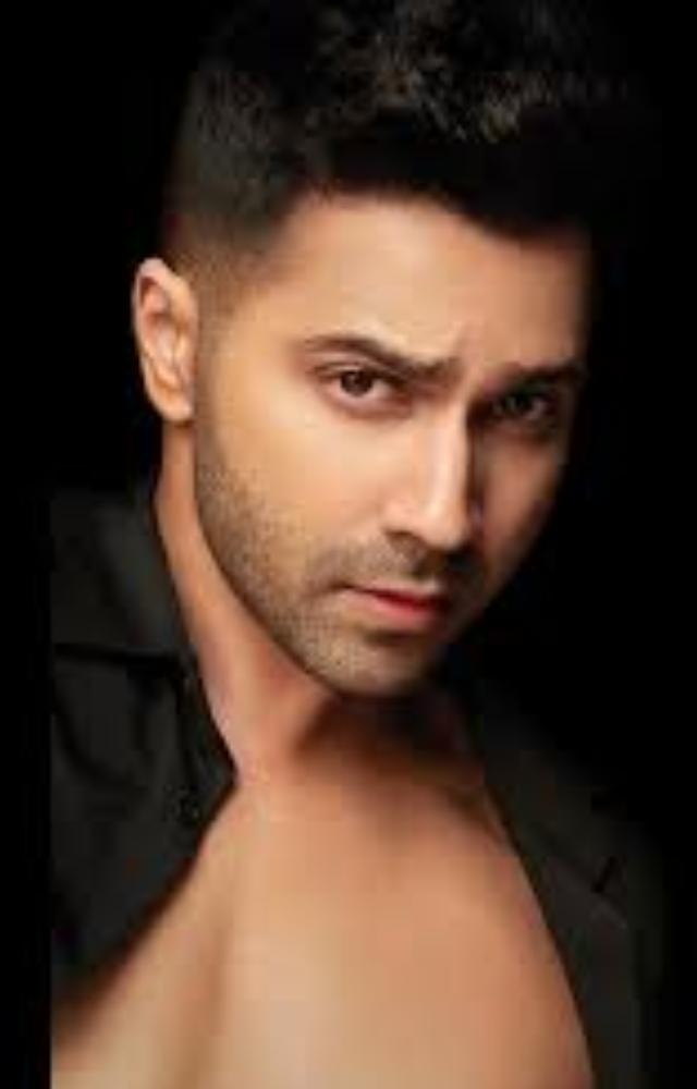 Son of David Dhawan, known for his versatile acting in films like 'Badlapur' and 'Sui Dhaaga.'