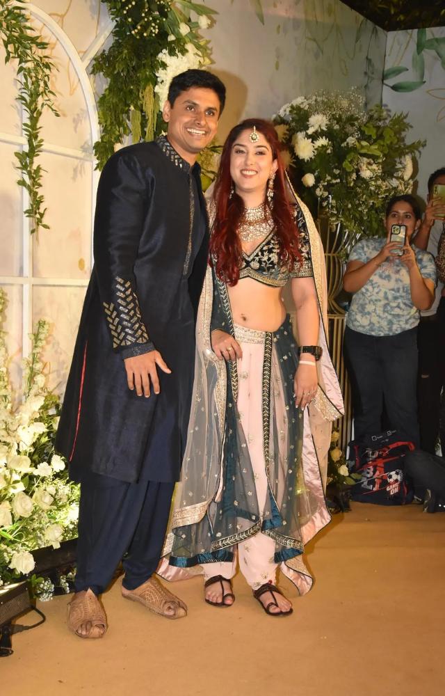Ira looked gorgeous in a deep-cut choli with pink and green coloured dhoti pants.