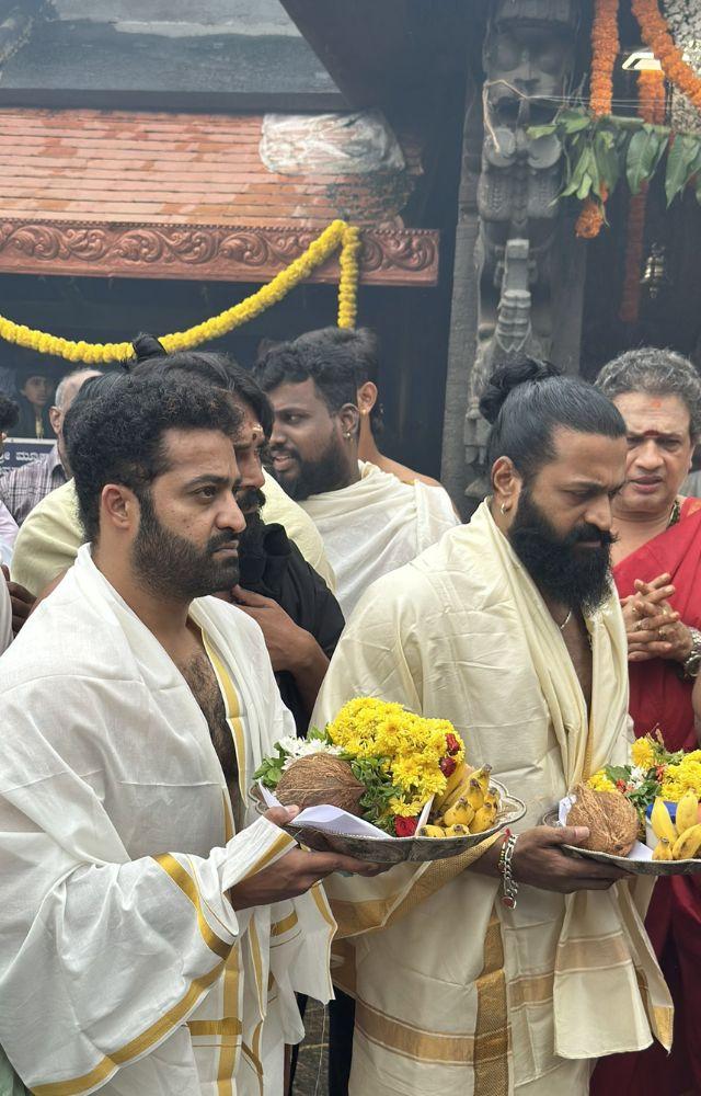 Jr NTR and Rishab Shetty`s matching traditional attire at Kolluru Temple, paired with their devotional offerings, captivates social media