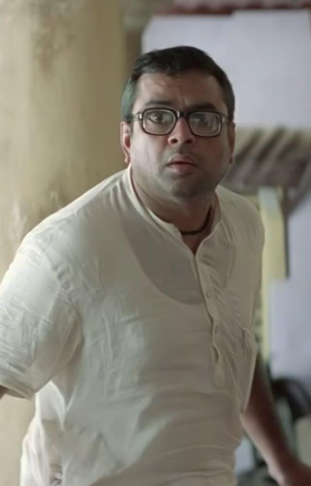 Rawal played a lovable, bumbling landlord who becomes a part of a hilarious money-making scheme with his tenants, Ram and Shyam.
