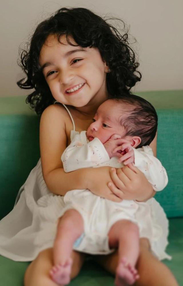 “After 9 long months, we finally met each other. This is me holding her for the first time. Her soft skin and her little heartbeats will always be remembered 