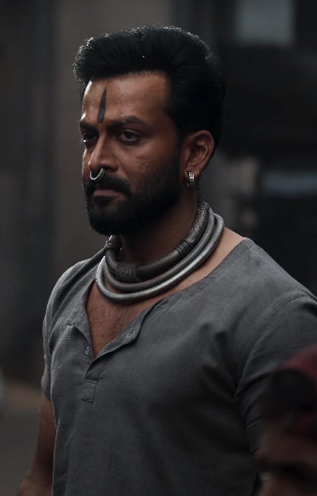 Actor Prithviraj will play the role of Vardharaja Mannaar in the movie Salaar. He look stunning in his rugged appearance and Fans are excited to see his role!