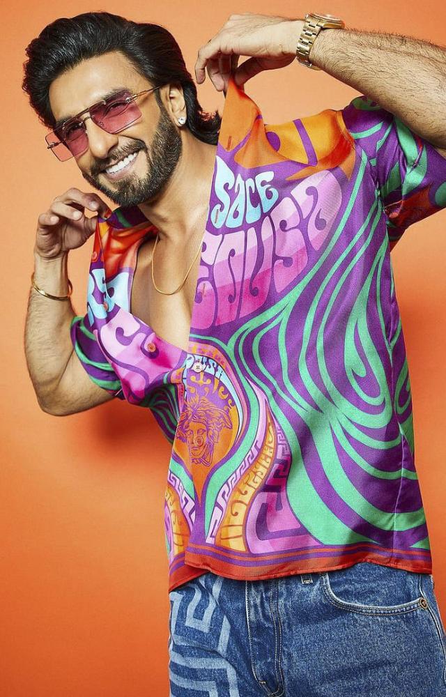 Ranveer Singh is renowned for his daring fashion sense, frequently donning vibrant colors and eye-catching bold prints.