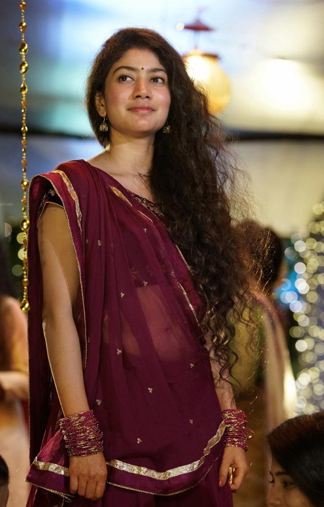 In this Telugu romantic drama, Sai Pallavi portrayed Bhanumathi, a strong-willed village girl, showcasing her versatility and natural acting.