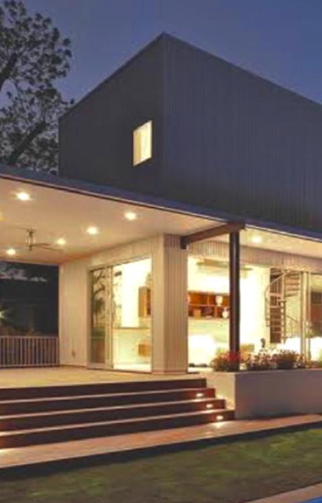 Samantha`s new home blends earthy vibe, adorned with captivating views, plush sofas, and a serene green garden. 