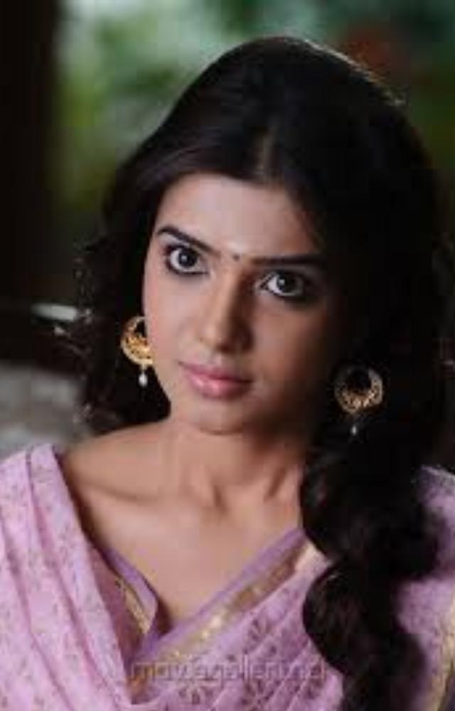 An energetic and playful journalist who brings lightheartedness and witty banter to the action, highlighting Samantha`s comedic timing and screen presence.