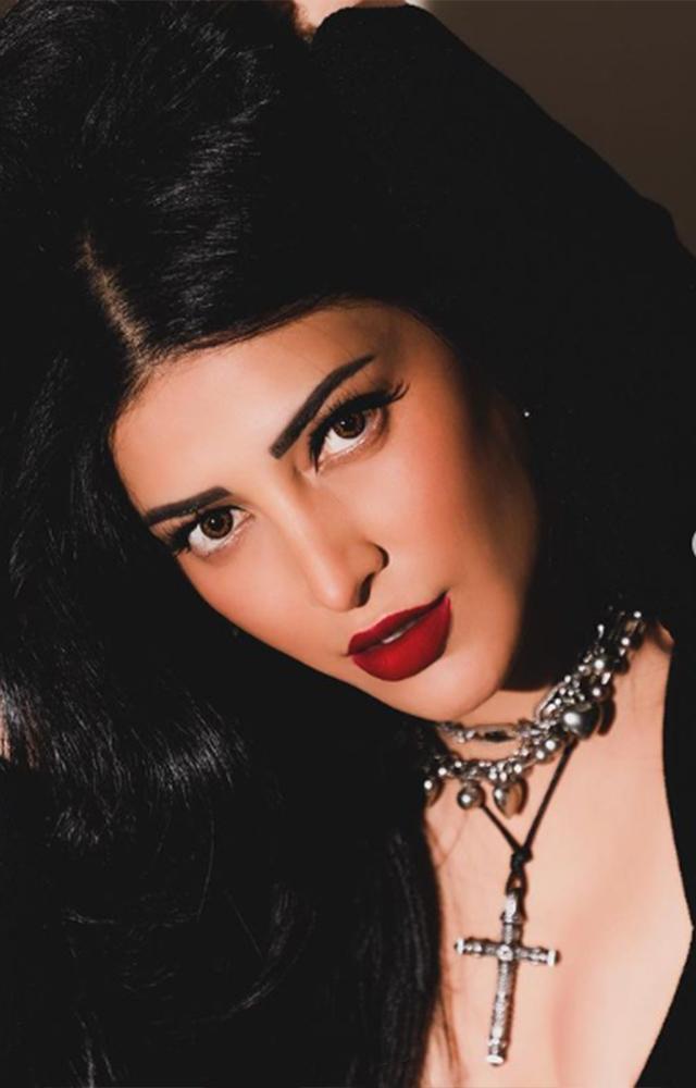 Witness the captivating allure as Shruti Hassan effortlessly blends hotness and boldness, showcasing a mesmerising combination of deep red matte lipstick