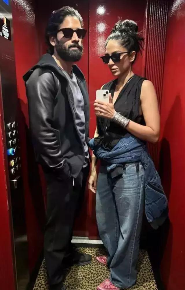 Sleek Selfie: Love in the Elevator