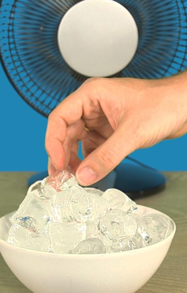 Place a bowl of ice water in front of a fan to circulate cooler air. Use exhaust fans in kitchens and bathrooms to remove hot, humid air.