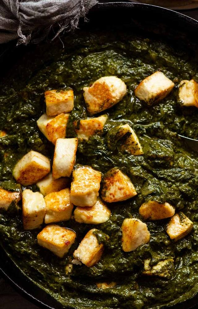 A green spinach-based curry combined with paneer provides a delicious and colorful dish that represents the green of the flag.
