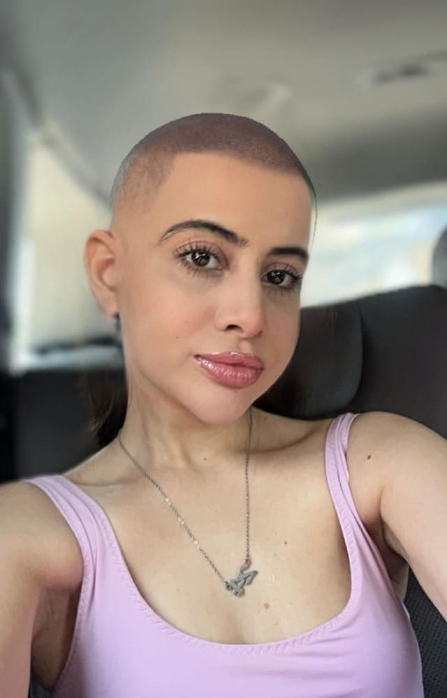 While it looks like she has shaved her head, if you look closely, you`ll spot Urfi Javed`s original hair near her neck. Though she would totally slay this look.